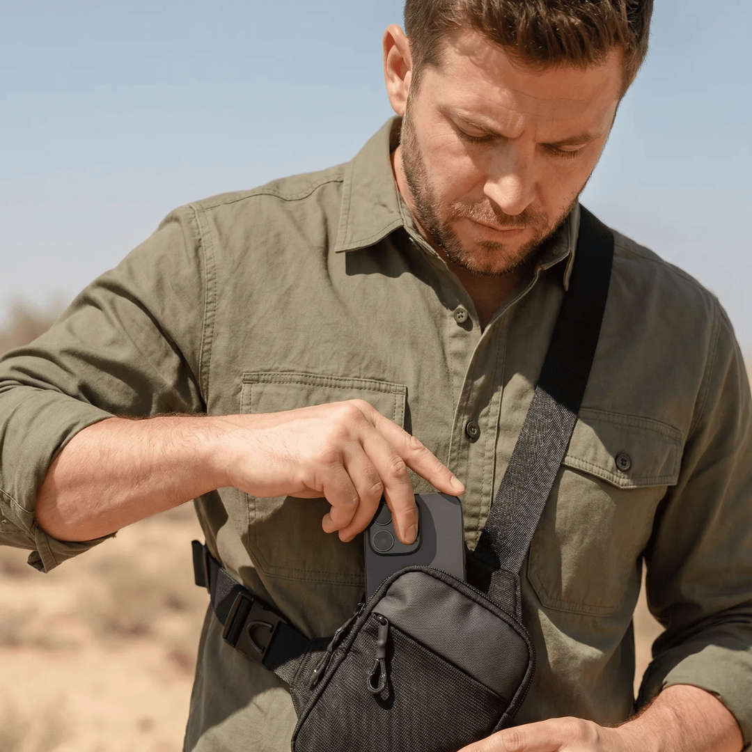 Travel sling bag worn close to the body