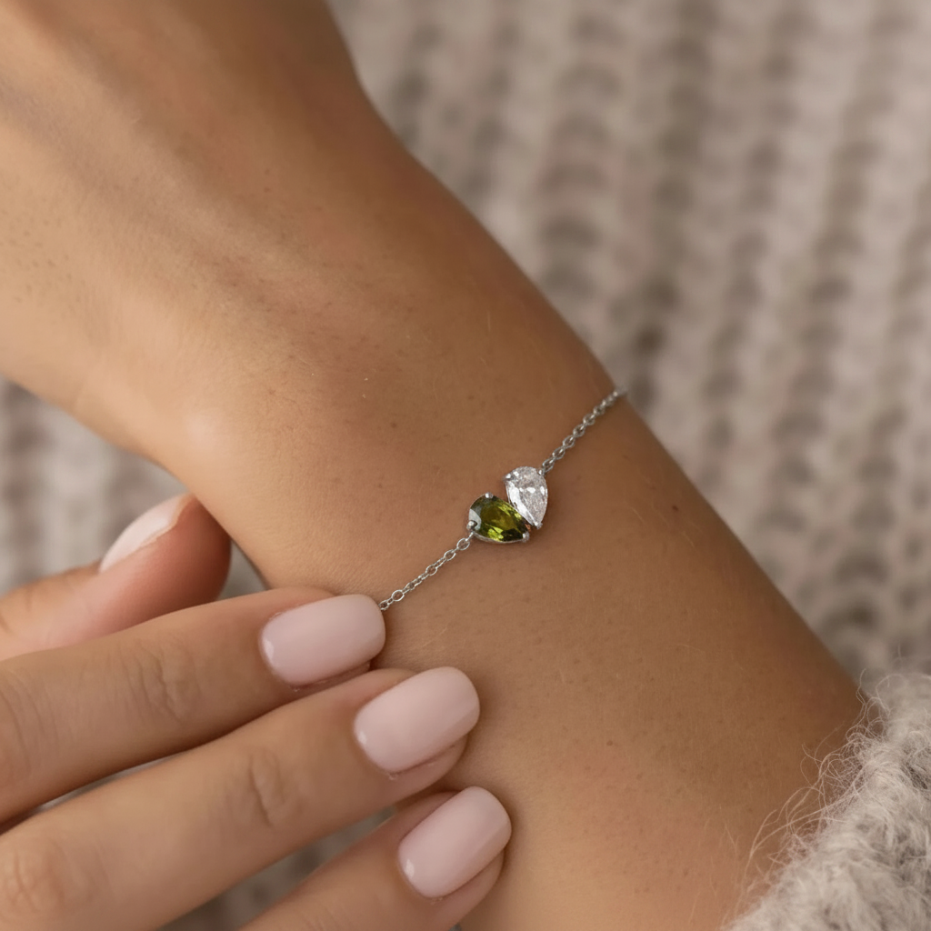 Lori Bracelet in silver with two teardrop birthstones, worn on wrist